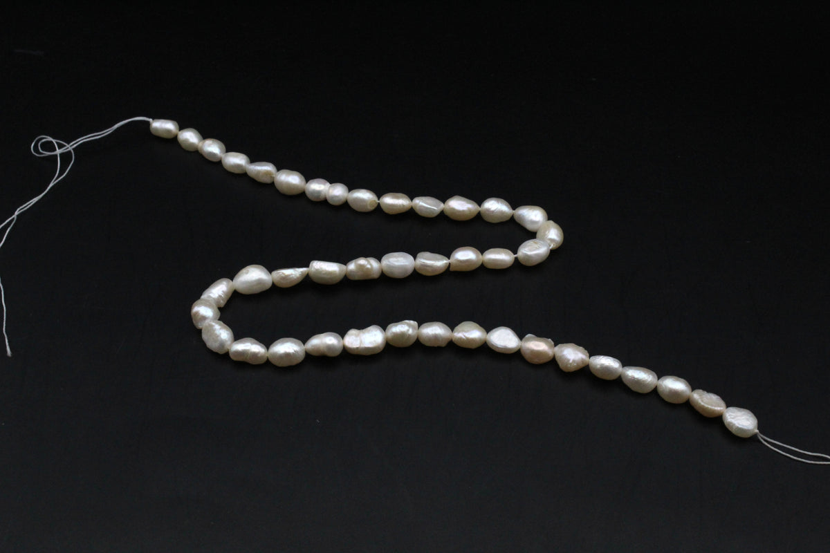 Fresh Water Peach Pearl Oval Barok Half Cut