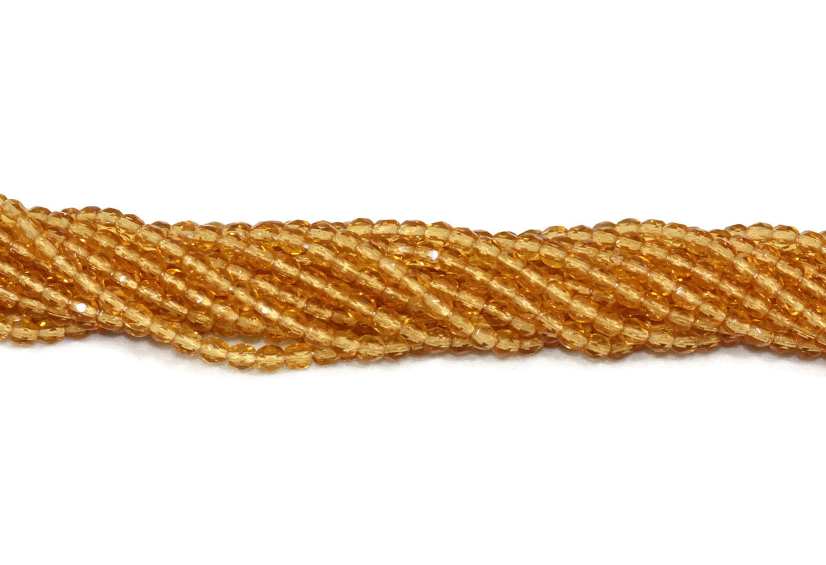 Butterscotch Yellow Glass Faceted Oval Beads 3 mm 8" strand