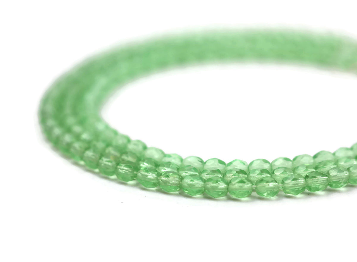 Light Green Fire Polished Czech Glass Faceted Oval Beads 4 mm