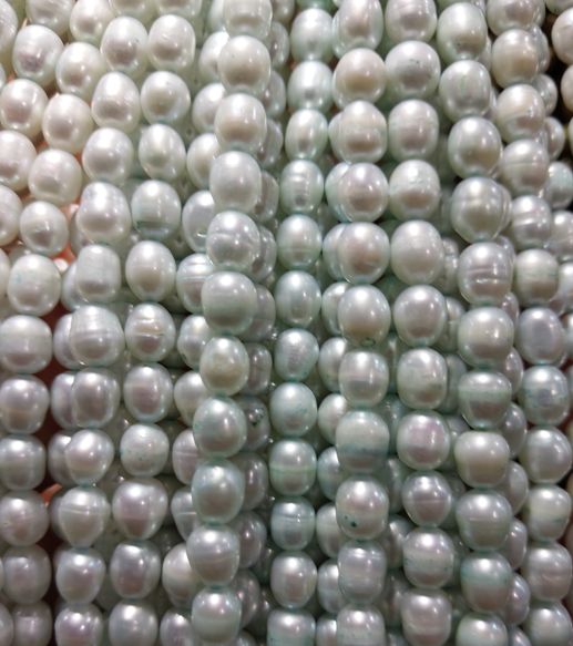 Freshwater Pearls rice beads white with blue detail 5x4mm