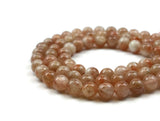 Sunstone Smooth Round Gemstone Beads 12mm 15" strand (34 pcs)