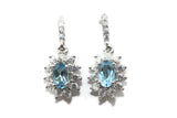 Rhodium Plated Sterling Silver Blue Cubic Zirconia Floral Dangle Earrings
